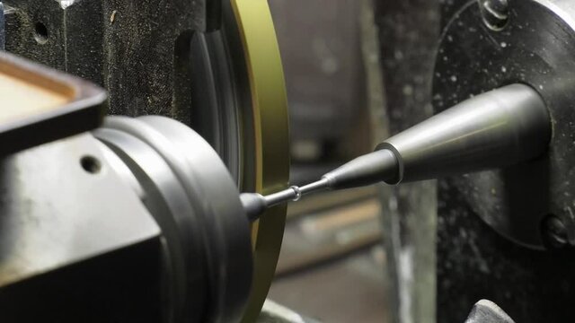 A diamond held by dop is polished on rotating automatic cast iron lap. Turning is one of the main operations in the technological cycle of diamond processing. Cutting and roughing diamonds.
