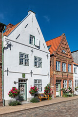 Fototapeta na wymiar Old gabled houses of Friedrichstadt - 5379