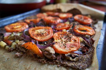 Healthy gluten-free and dairy-free pizza. Pad made from flaxseed. 