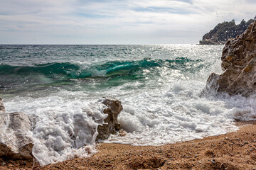 Waves Crashing on Rocks of the Mogren Beach