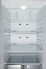 Clean empty refrigerator. Cleaning home fridge. Empty big home refrigerator inside.