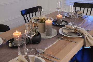 Festive table setting with beautiful tableware and decor indoors