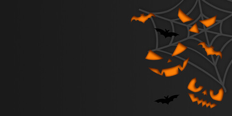 Halloween concept background with carved pumpkins and bats