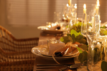 Festive table setting with beautiful tableware and decor indoors