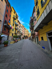 Main street of the village of riomaggiore, cinque terre, Italy. The alleys of riomaggiore full of colors never forget