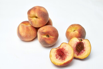 fresh ripe peaches on white background