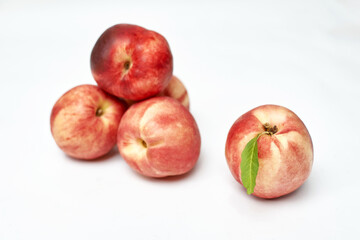 Fototapeta na wymiar fresh ripe peaches on white background