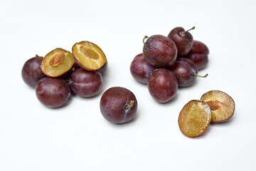 ripe plum on white background