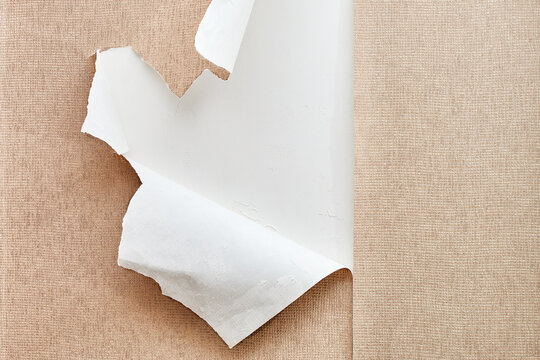 hole in the wallpaper on the wall