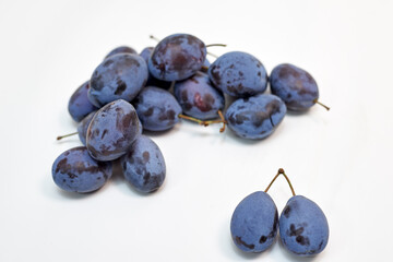 ripe plum on white background