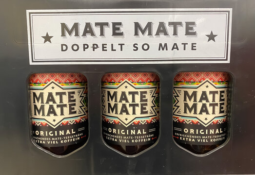 Viersen, Germany - October 9. 2021: Closeup of crate mate mate soft drink in shelf of german supermarket