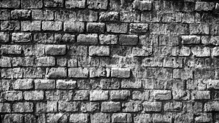 grunge background of black and white old brick