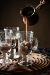 coffee latte process brewing on a wooden board. High quality photo