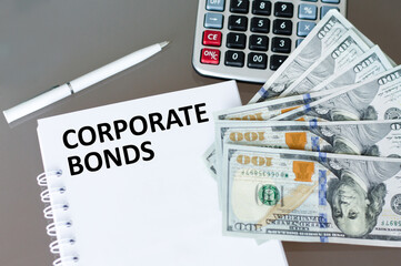 notebook on the table with words government bonds. Trading concept.