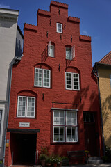 Naklejka premium Luebeck, Germany - July 20, 2021 - a typical crow-stepped gabled town house