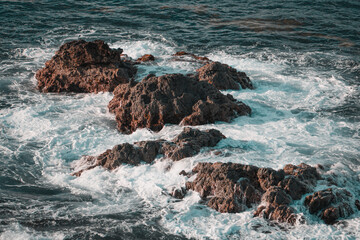 Fototapeta na wymiar Playa con rocas