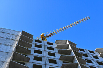 Naklejka premium Crane and highrise construction site