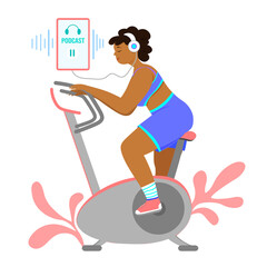 Dark - skinned girl listens to a podcast on a mobile and is engaged on an exercise bike