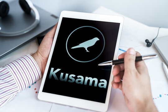 Moscow Russia 20.07.2021 Logo of Kusama coin in mobile phone. Cryptocurrency KSM token. Trading blockchain platform to buy,sell on decentralized exchange DEX. Digital money.Business,investing