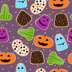 Seamless pattern with Halloween pumpkin cookies. Halloween pumpkin bread purple background.