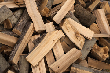 Wooden natural log closeup. Stack of fire wood 