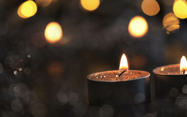 Candle lights glitter bokeh with dark Background