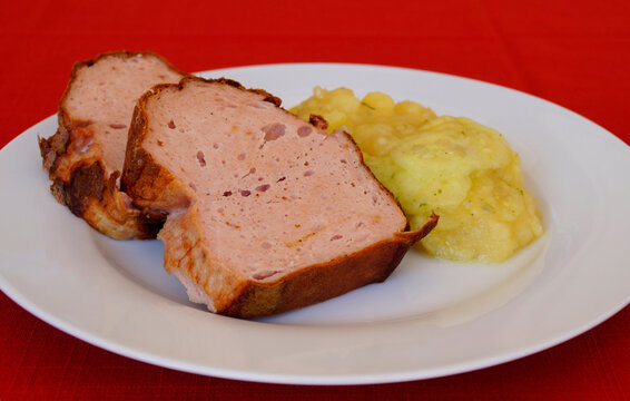 delicious traditional Swabian or Bavarian leberkas with cold potato salad (a type of meat loaf popular in Germany and Austria), Munich, Bavaria, Germany