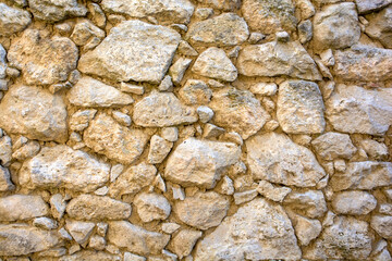 Stone texture for graphic design resources. Warm tones with large and small stones not uniformed. 2015