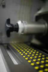 Fototapeta na wymiar Production line pharmaceutical industry. Manufacturing of drugs and medications, pharmaceuticals.