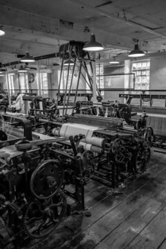 Vintage Looms Weaving Cotton On Mill Factory Floor