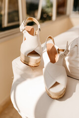 white platform-style women's sandal with cork details - shoes for the bride to wear on her wedding...