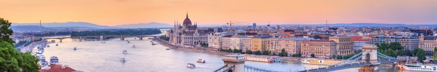 Fototapeta premium City summer landscape, panorama, banner - top view of the historical center of Budapest with the Danube river, in Hungary