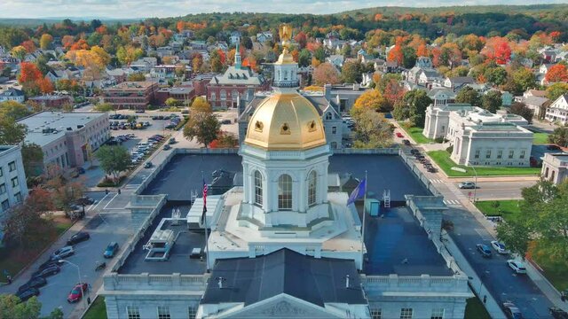 Aerial Zoom Out From Gold Dome Of Capital Building In New Hampshire.