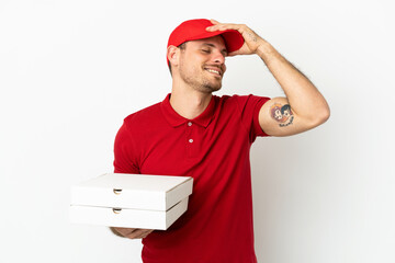 pizza delivery man with work uniform picking up pizza boxes over isolated  white wall has realized...