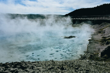 Excelsior Geyser, which located in the Midway Geyser Basin in Yellowstone National Park, drains 4,000-4,500 gallons of water per minute into the Firehole River.