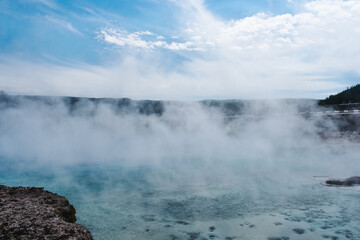 Excelsior Geyser, which located in the Midway Geyser Basin in Yellowstone National Park, drains 4,000-4,500 gallons of water per minute into the Firehole River.