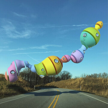 Render of a surreal sliced floating bubbles on a country road