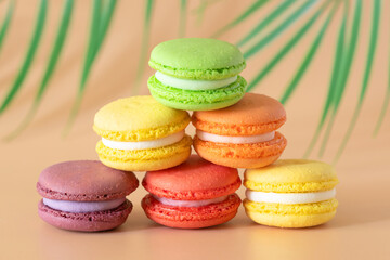 multicolored macaroons are stacked in a pyramid