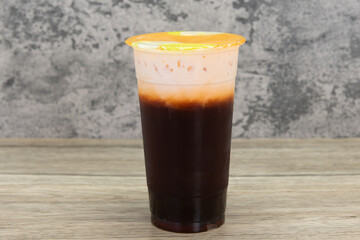 Ice cold thai tea will quench that thrist and satisfy that sweet craving all in one beverage