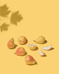Autumn or fall composition made of pears and shadows. Minimal nature seasonal conccept.