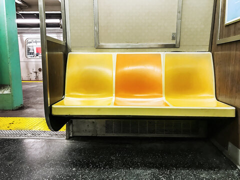 Empty seats in a NYC subway car. © Roman Tiraspolsky