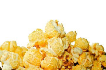 Yellow aromatic butter popcorn isolated on white background