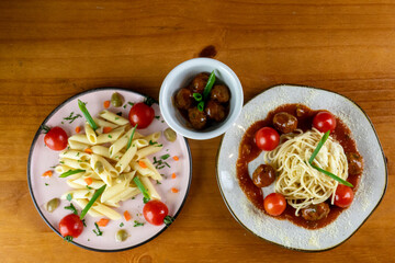 delicious pasta, served with meatballs on wooden table, top view photo with space for text