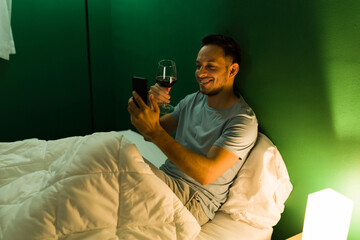 Cheers! Happy man on a video call