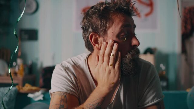 Drunk man suffering from hangover