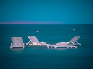 Fototapeta premium lounge chairs on the beach