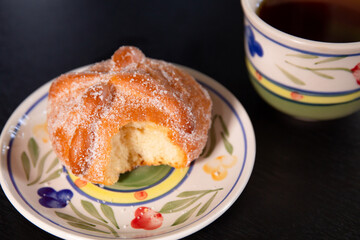 Pan de Muerto with a bite Served with coffe 