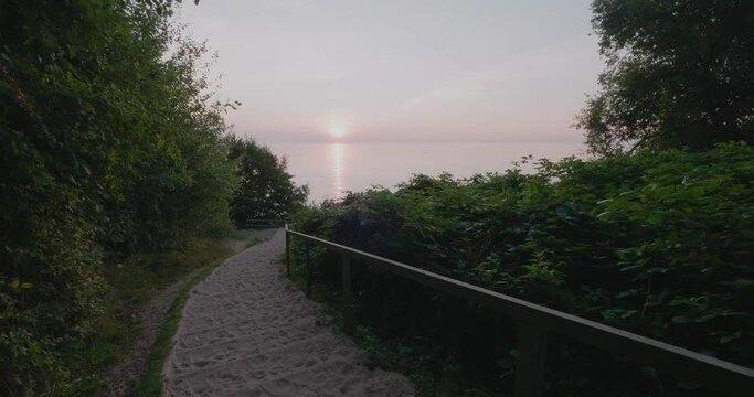 Sandy Stairway Down To Sunrise at Kn&auml;b&auml;ckshusen Beach in South Sweden &Ouml;sterlen, Static Wide Shot