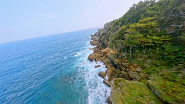 Foamy Waves Crash Into Rugged Cliffs At The Shore Of Cabo Frances Viejo National Park In Cabrera, Dominican Republic. FPV