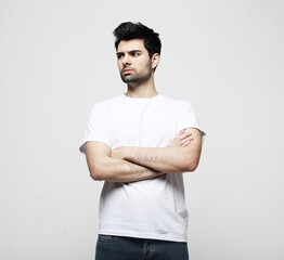 lifestyle, fashion and people concept: handsome man, fashion model posing over white background